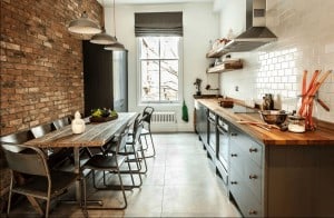 freshome.com- Galley Kitchen with brick wall