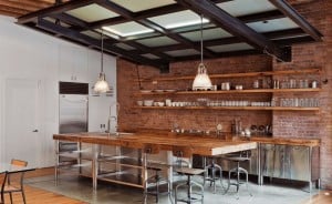 industrial like kitchen with large wooden island