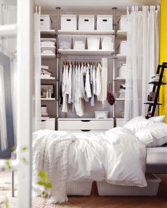 livesimplybyannie.wordpress.com- Same color storage for open closets