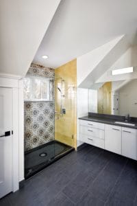 yellow accent tile shower