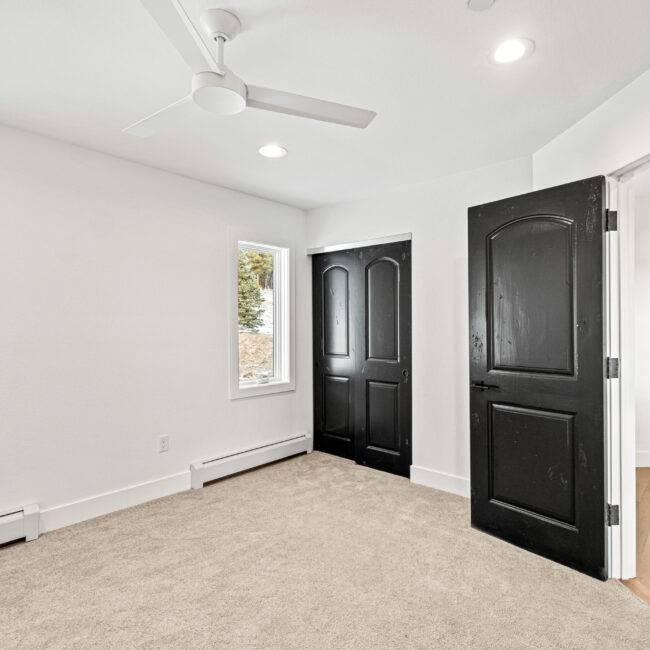 Custom Mountain Home - Empty Bedroom Leading to Hallway